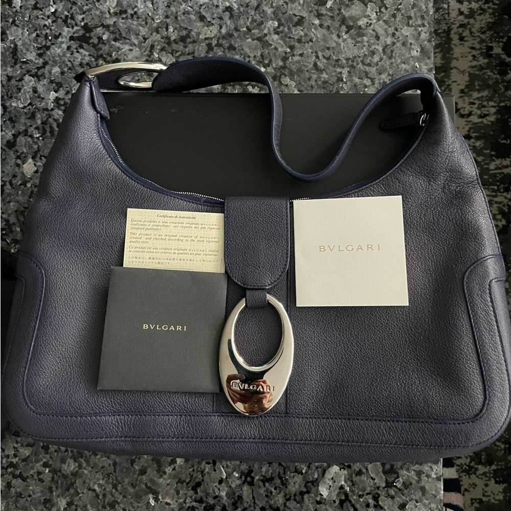 Pristine Rare BVLGARI Leather Navy Bag. Zipper top w/front magnet medallion.